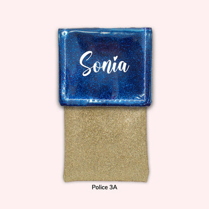 Two-tone pouch with midnight blue flap, sequins